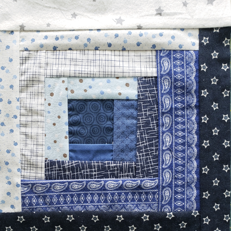 Scrappy log cabin quilt sqare Scrappy log cabin quilt sqare